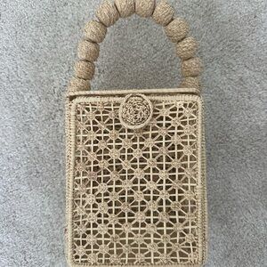 Elegant Tan Woven Handbag